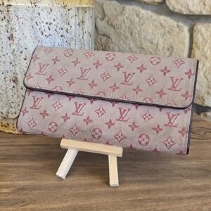 Louis Vuitton Monogram Mini Lin Porte-Tresor International Wallet.